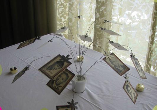 Create a centerpiece with photos of the departed